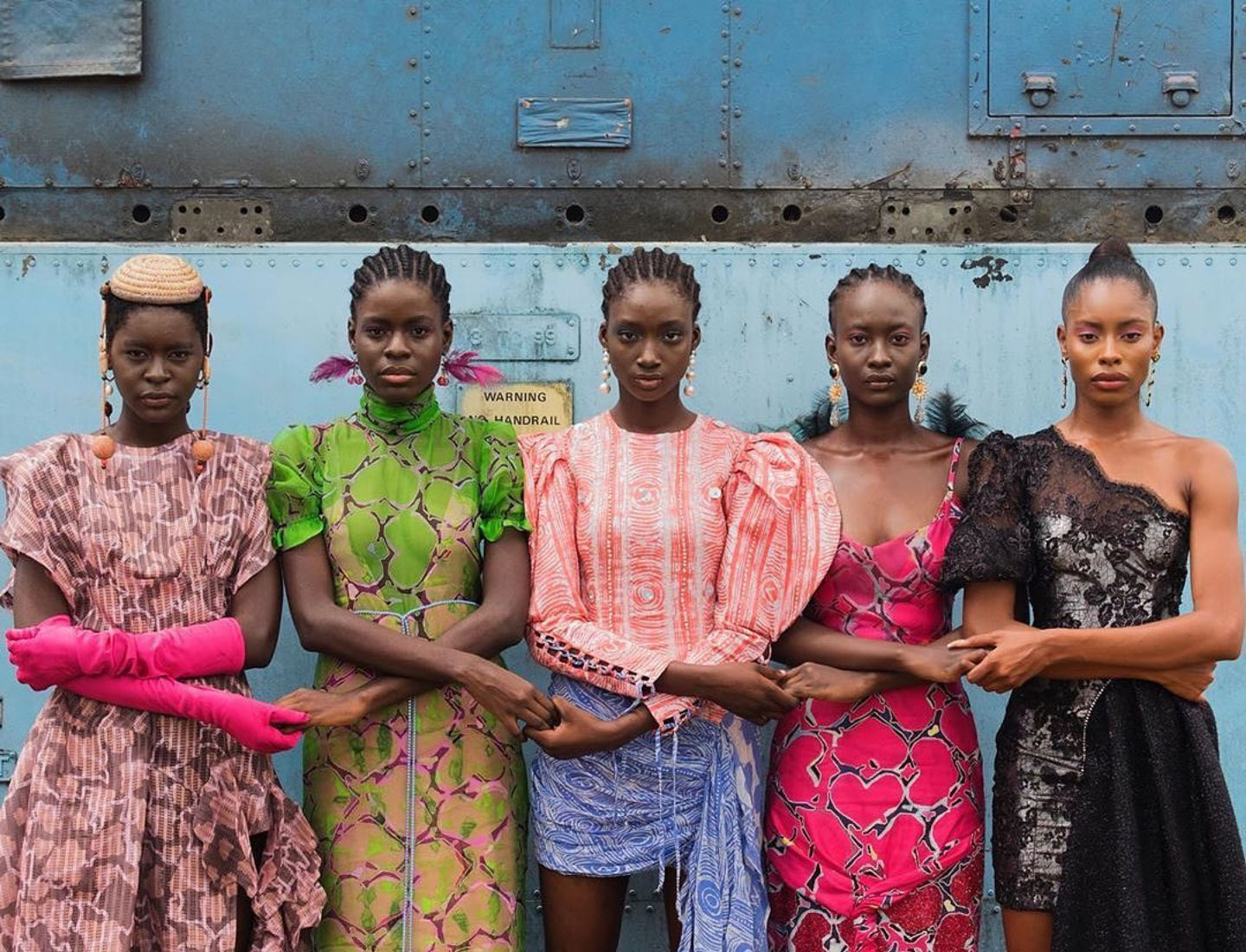 Models holding hands, Lagos, Nigeria, 2019 by Stephen Tayo. Courtesy Lagos Fashion Week  © Victoria and Albert Museum, London