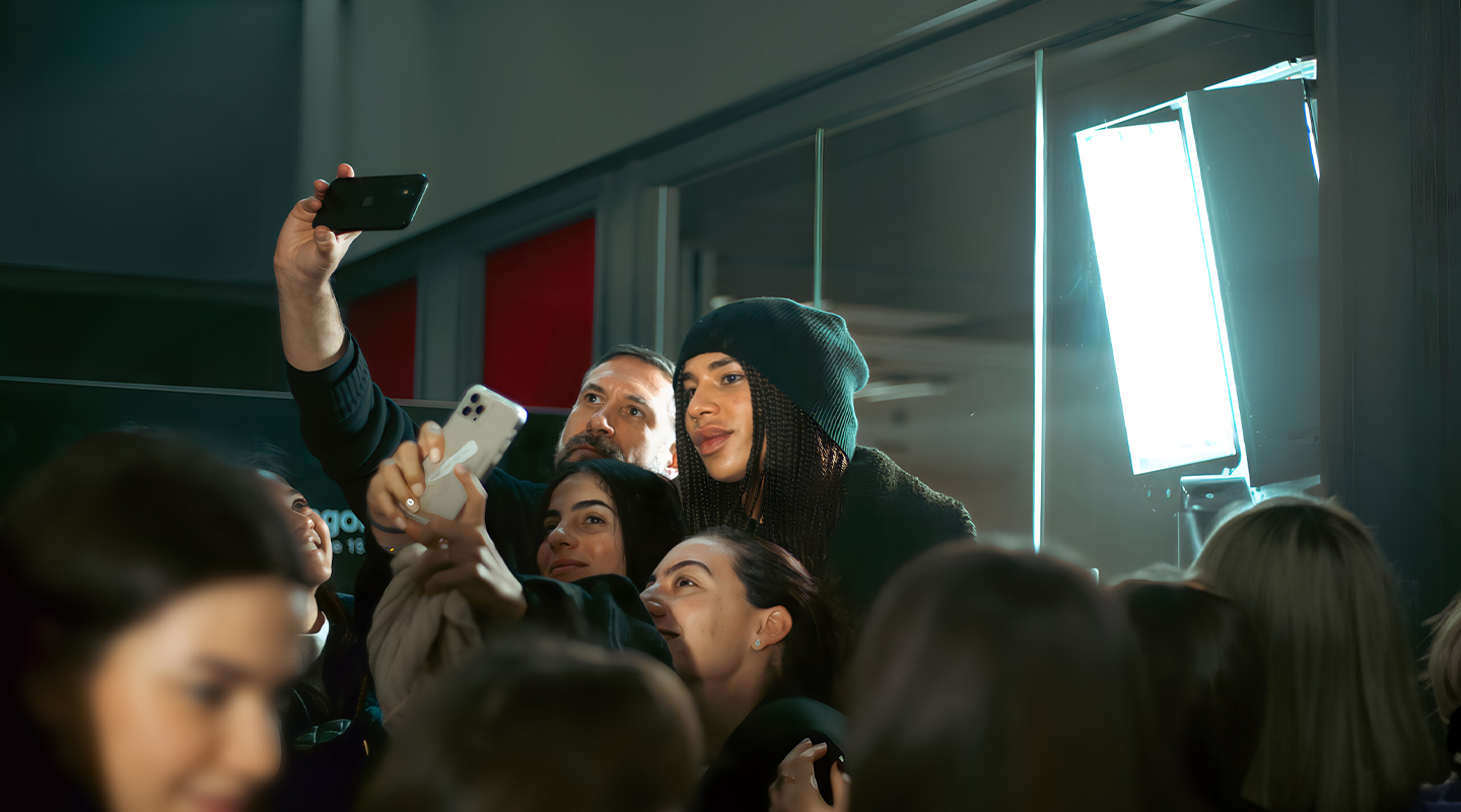 Olivier Rousteing taking photos with students after the exclusive event at Istituto Marangoni Paris