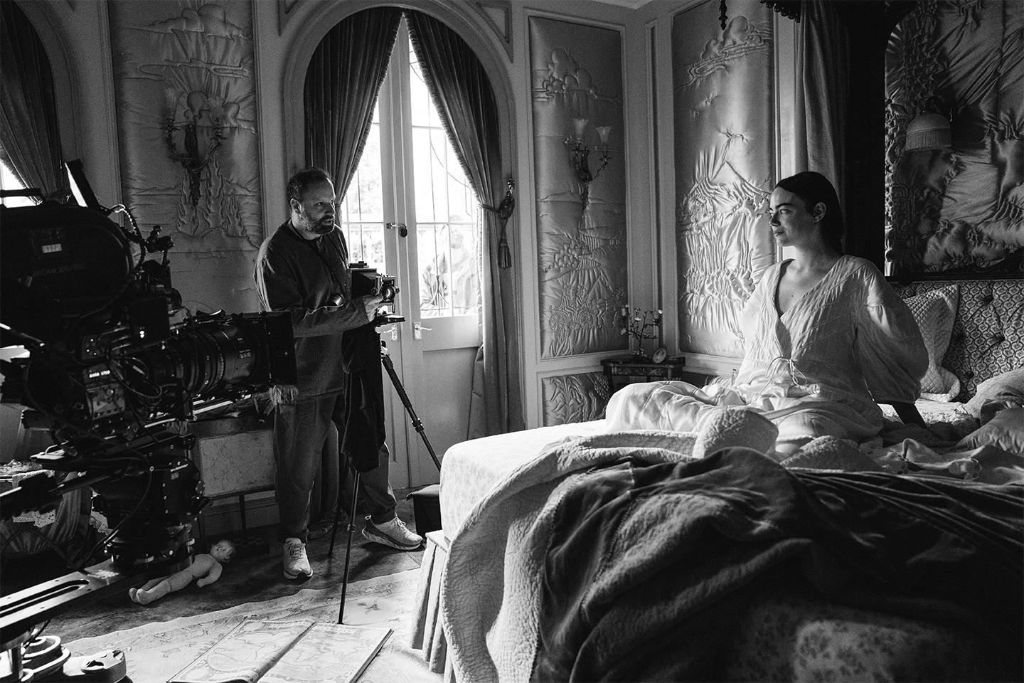 Director Yorgos Lanthimos and actress Emma Stone behind the scenes during the filming of 'Poor Things.' Courtesy of Searchlight
