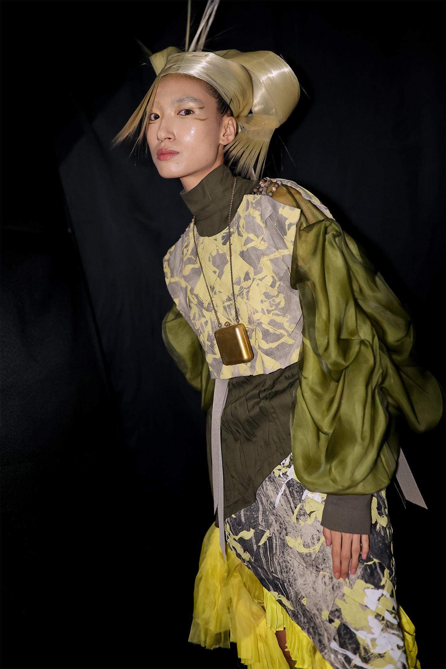 Model in a look by Istituto Marangoni Shenzhen Fashion Designer of The year 2023 Chen Tingting, wearing a special wig with customised hairstyle