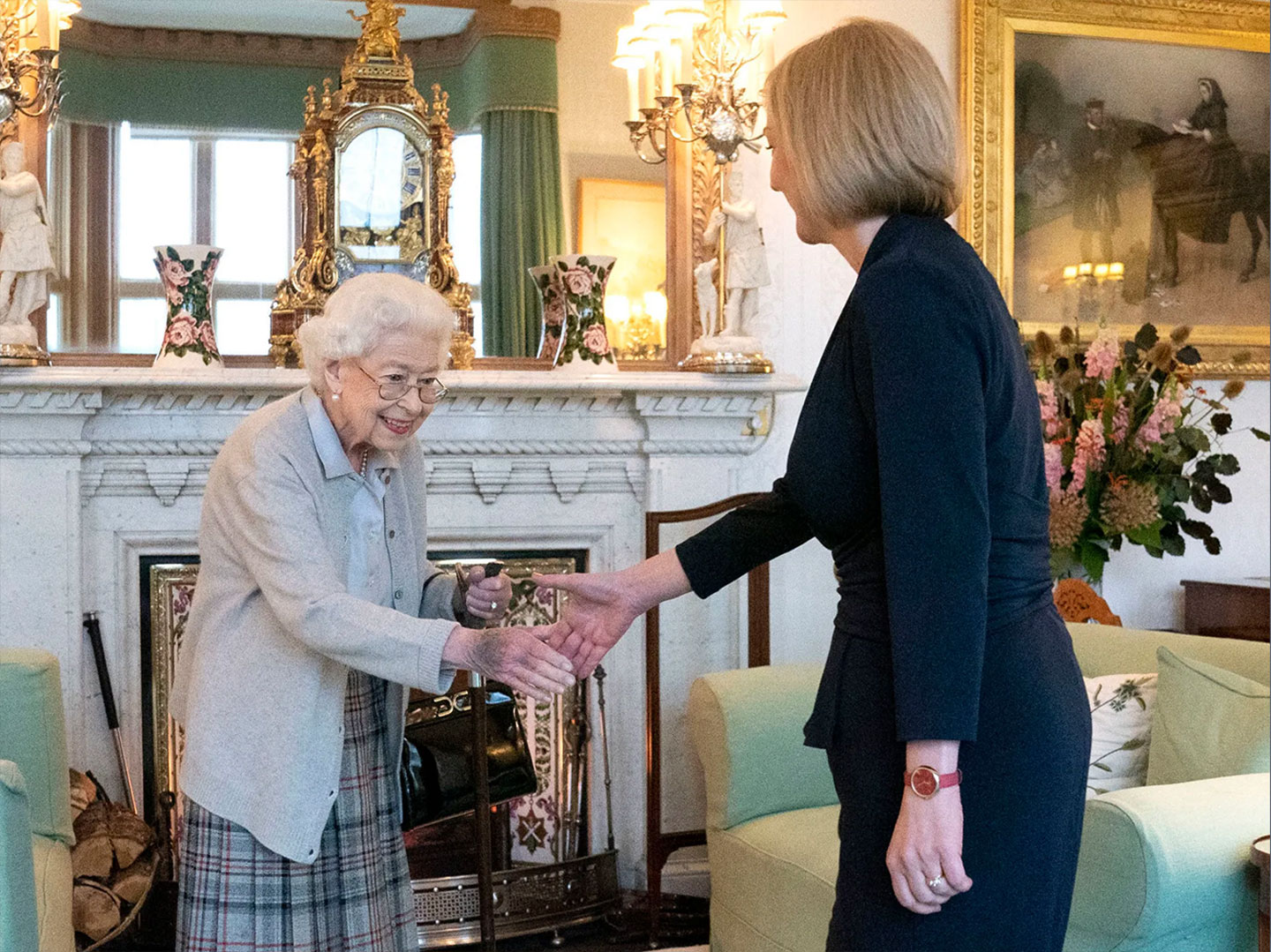 Queen Elizabeth greets newly elected leader of the Conservative party Liz Truss as she arrives at Balmoral Castle for an audience where she will be invited to become Prime Minister and form a new government on September 6, 2022 in Aberdeen, Scotland. The Queen broke with the tradition of meeting the new prime minister and Buckingham Palace, after needing to remain at Balmoral Castle due to mobility issues