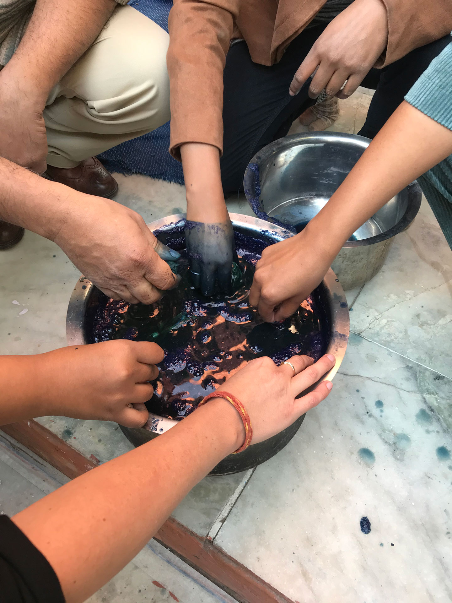 All hands in the indigo dye pot