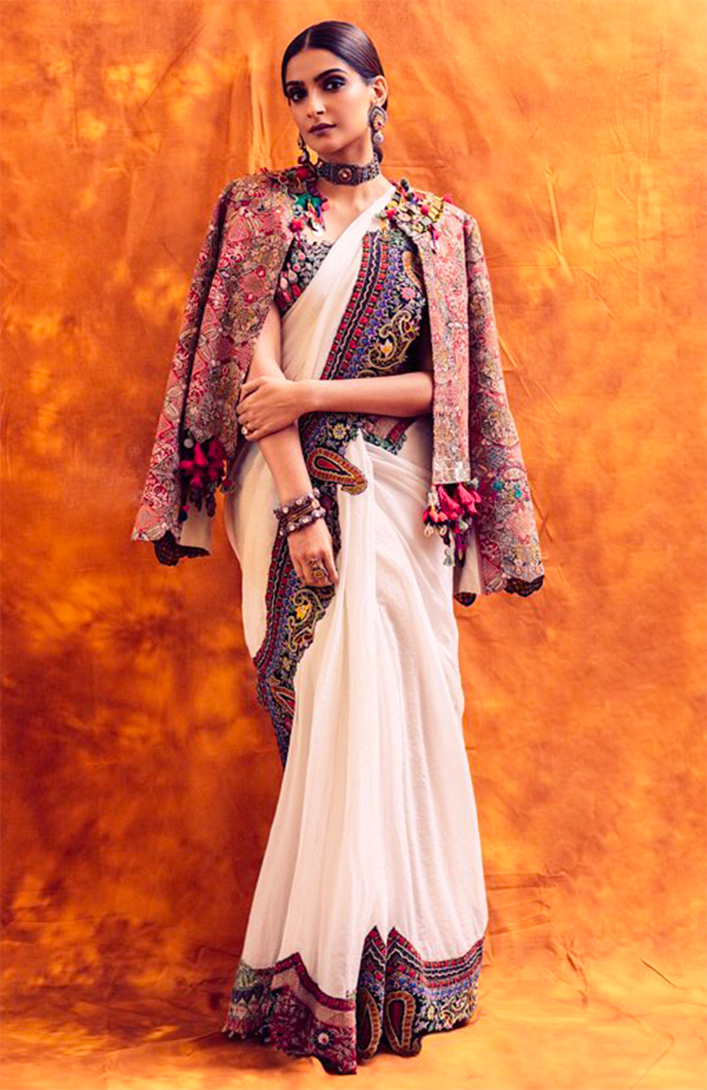 Sonam Kapoor Ahuja layered her Anamika Khanna white sari with a bohemian jacket. Image: Instagram.com, @sonamkapoor