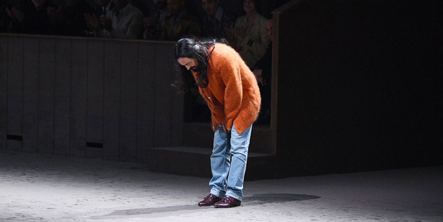 Alessandro Michele at the end of one of his Gucci fashion shows, bowing to the audience
