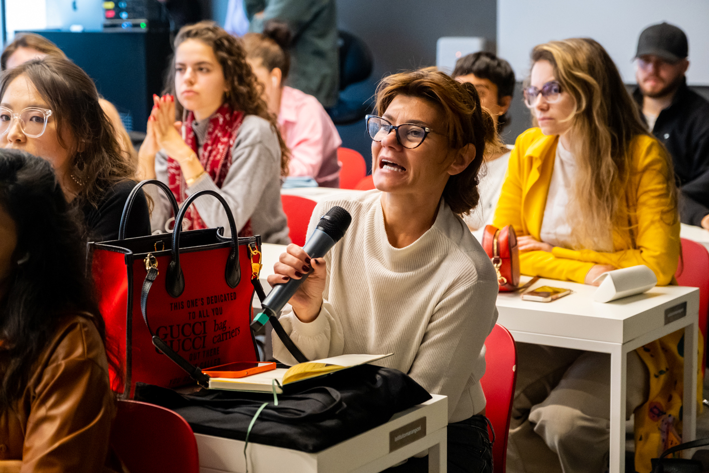 Attendee asking Walter Chiapponi a question during the launch of his mentorship programme at Istituto Marangoni Milano