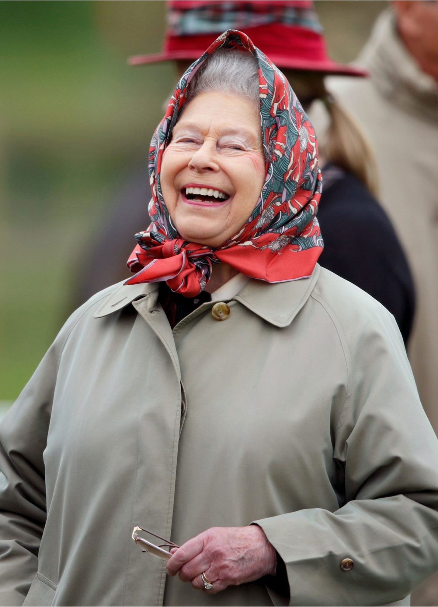 The Queen wearing a Hermès scarf.