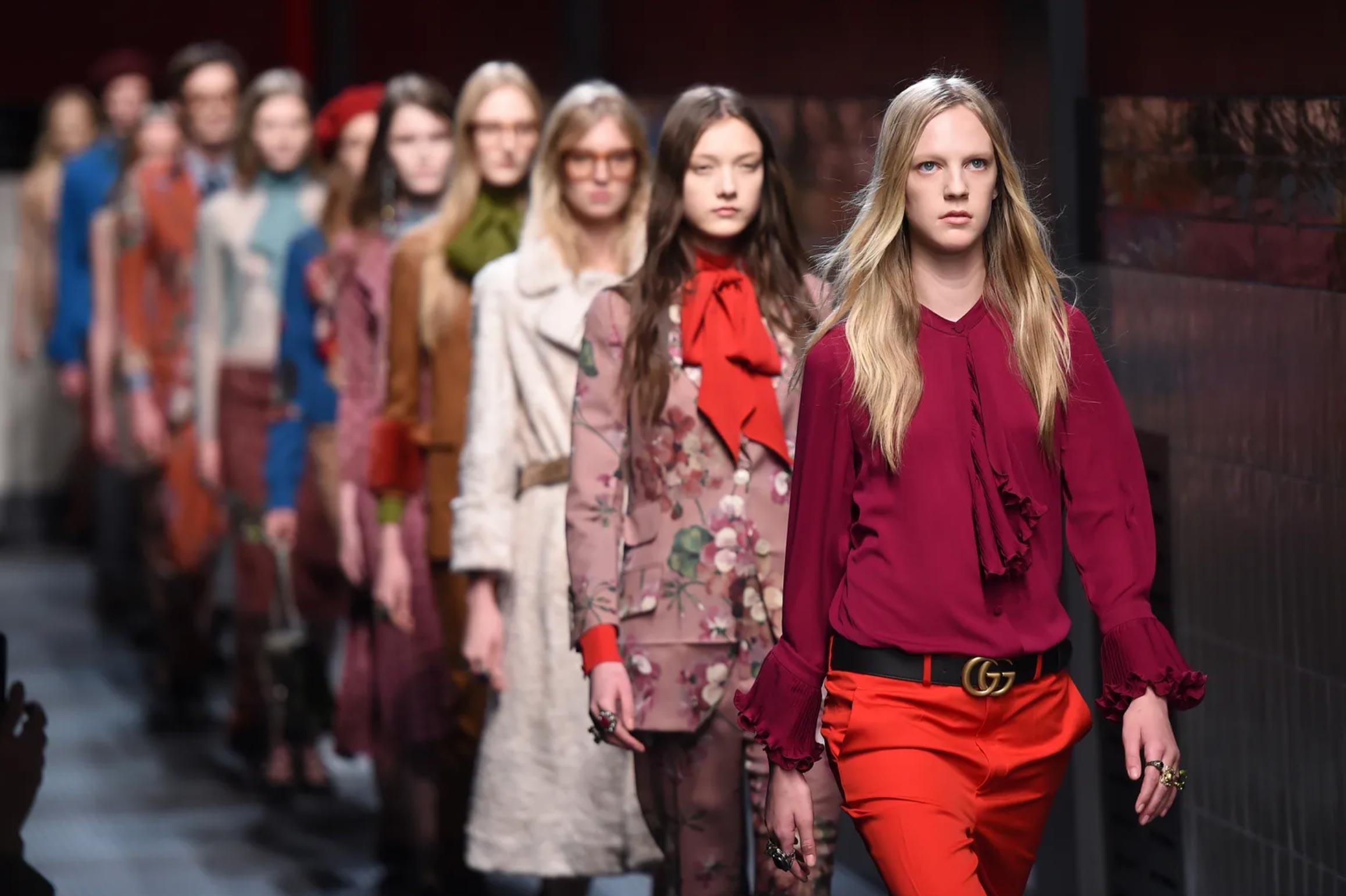 Models wearing creations for Gucci women's Fall-Winter 2015-2016 collection, part of the Milan Fashion Week