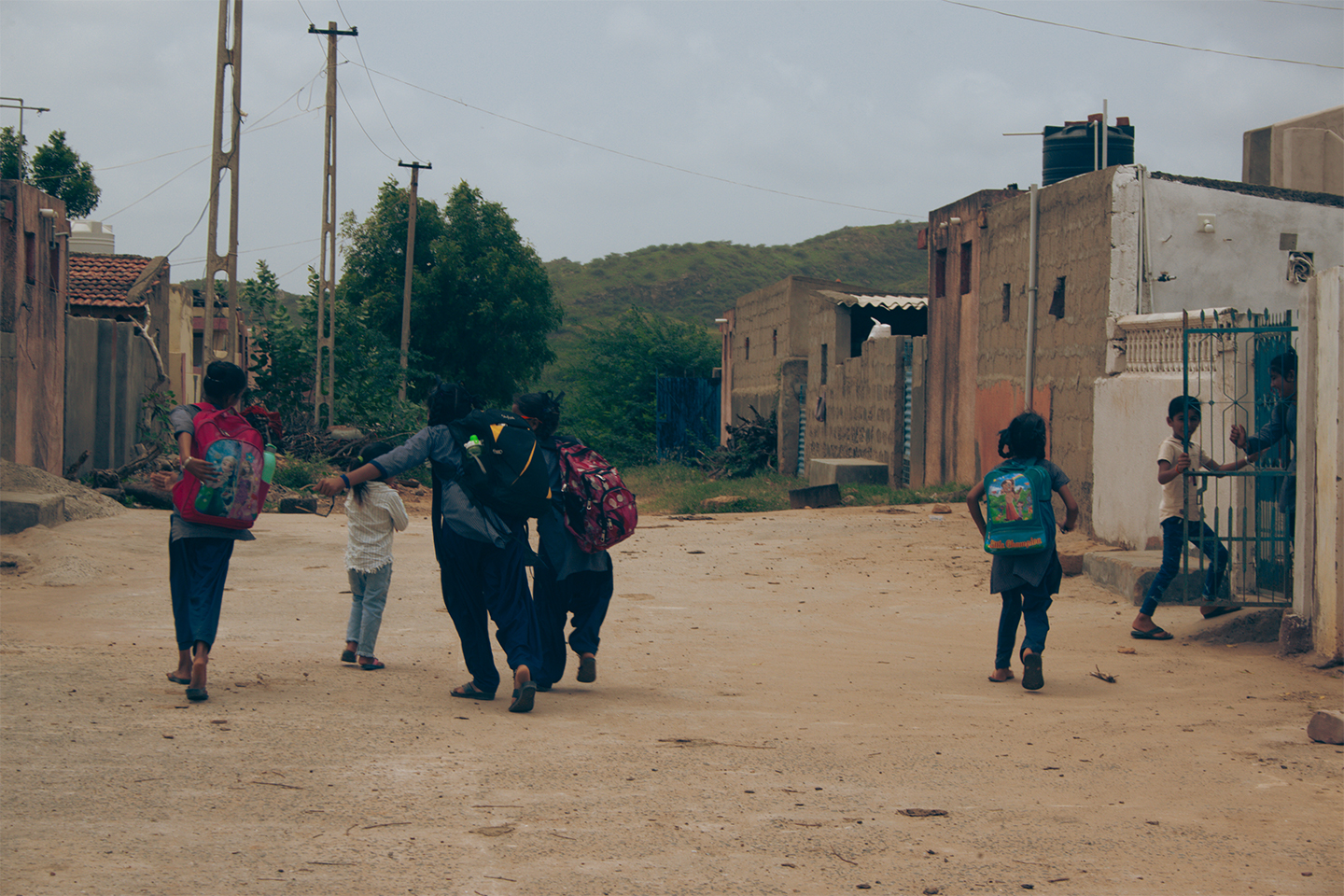 Children running to their homes