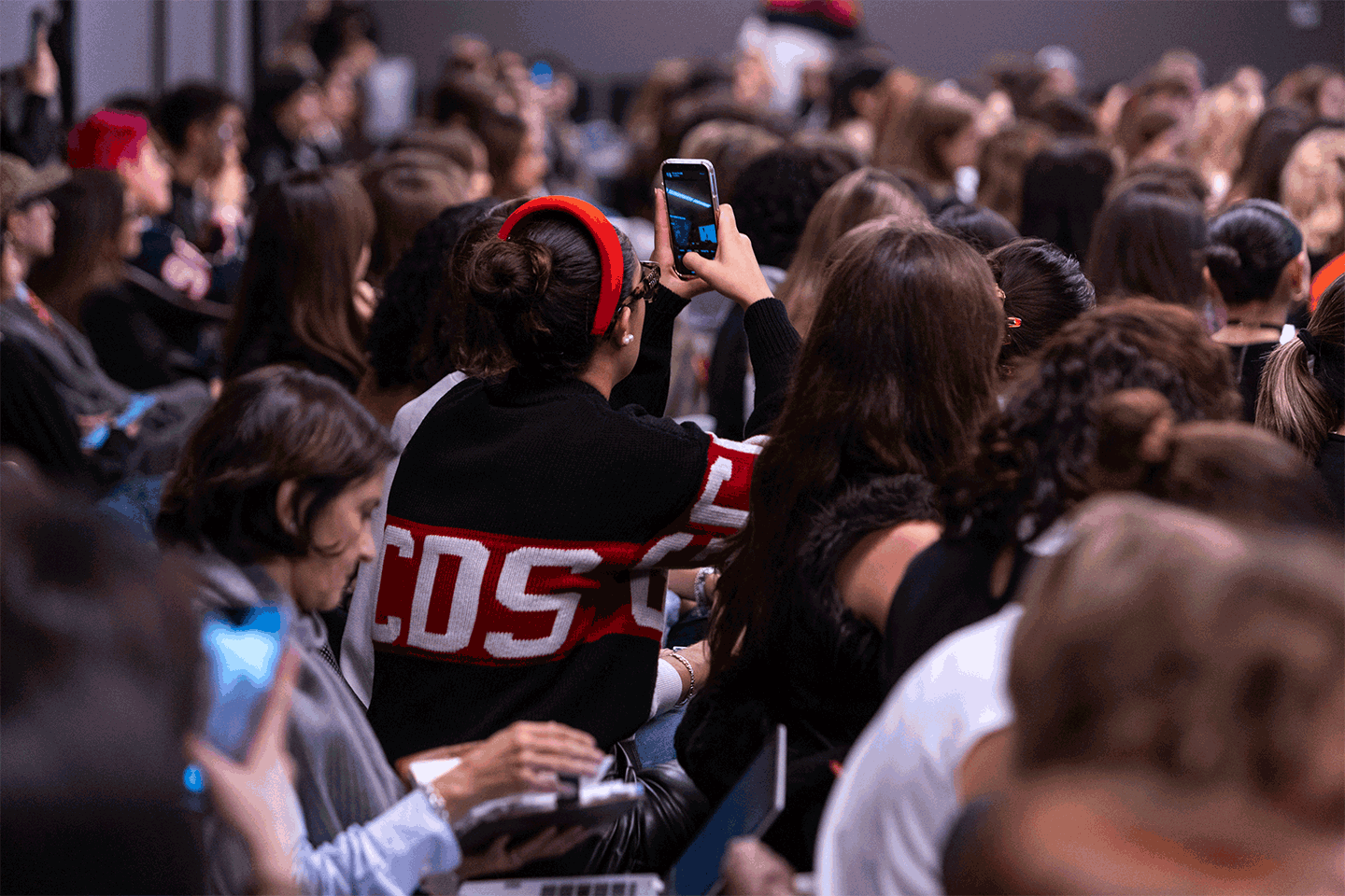 An Istituto Marangoni Milano student wearing a GCDS jumper attending the launch event of Giuliano Calza's mentorship 