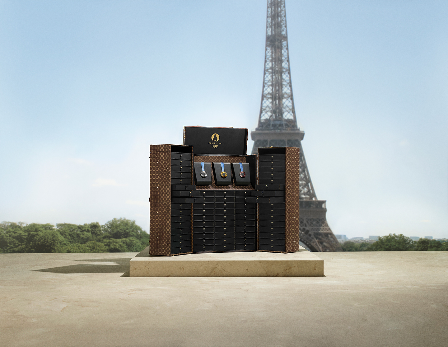 Louis Vuitton presented the Medals Trunks and Torches Trunks, special trunks created for the upcoming Olympic and Paralympic Games, as part of LVMH's Premium Partnership with Paris 2024. Photo courtesy of Louis Vuitton