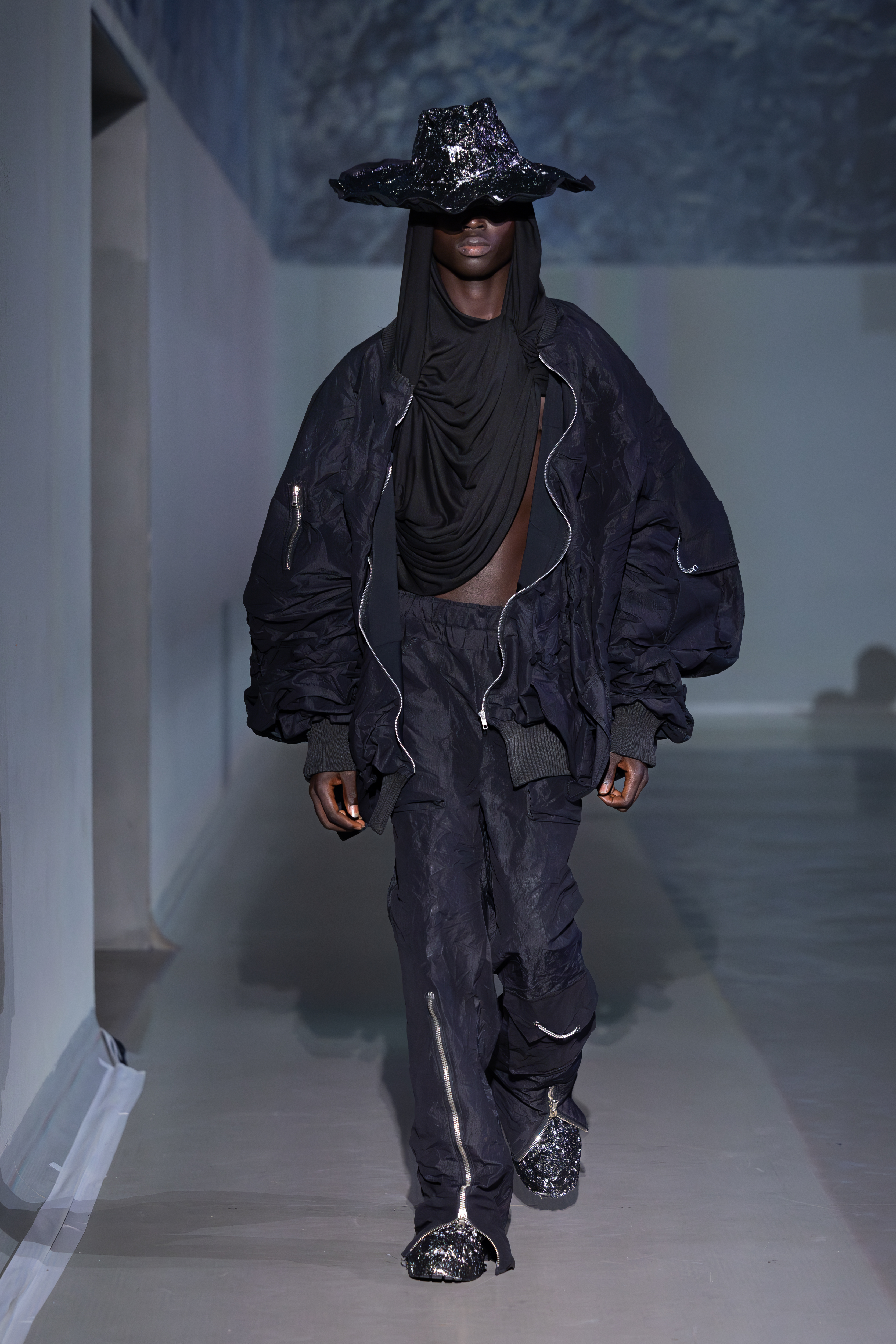 Theo Moraes Garcia de Campos' degree collection, As the Solid Meets the Fluid, which was showcased at the London Graduate Fashion Show 2024.