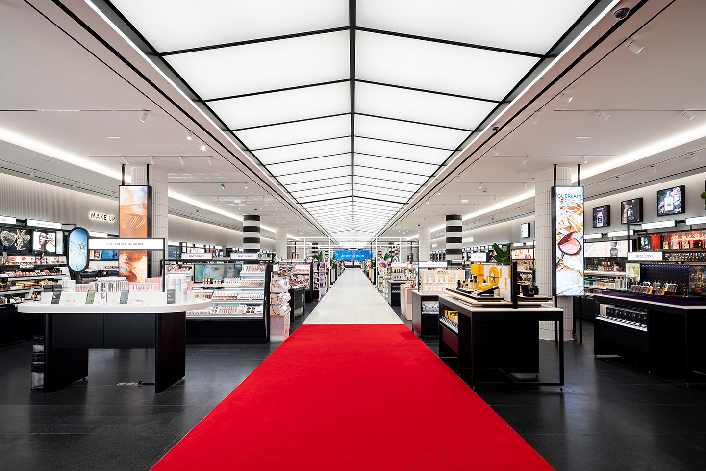 Sephora Champs-Élysées didn't simply unveil a red carpet; they curated an entrance that whisked visitors away to the Met Gala of beauty. Courtesy of Sephora