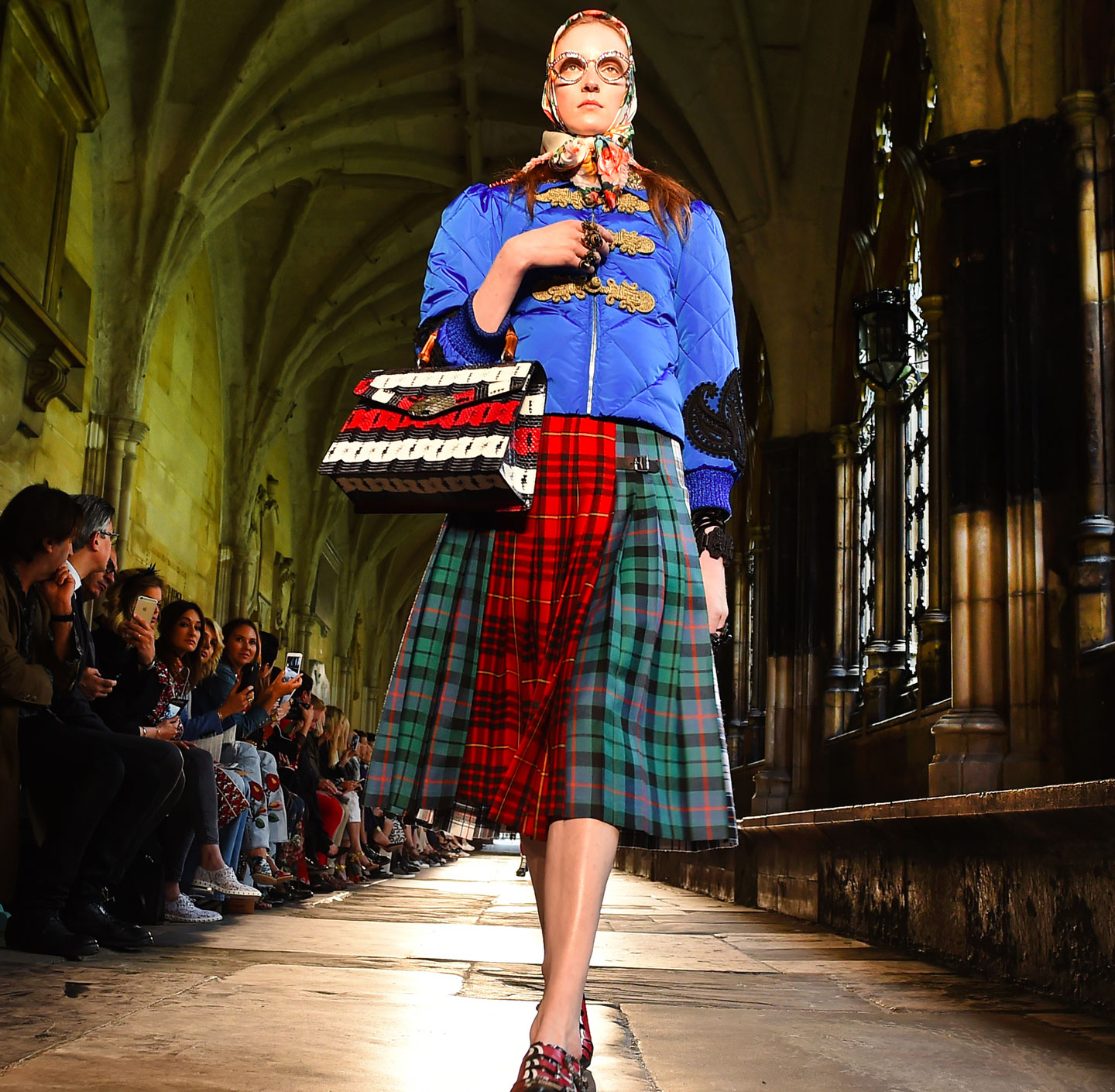 A model walks the runway during the Gucci Cruise 2017 fashion show at the Cloisters of Westminster Abbey on June 2, 2016 in London, England