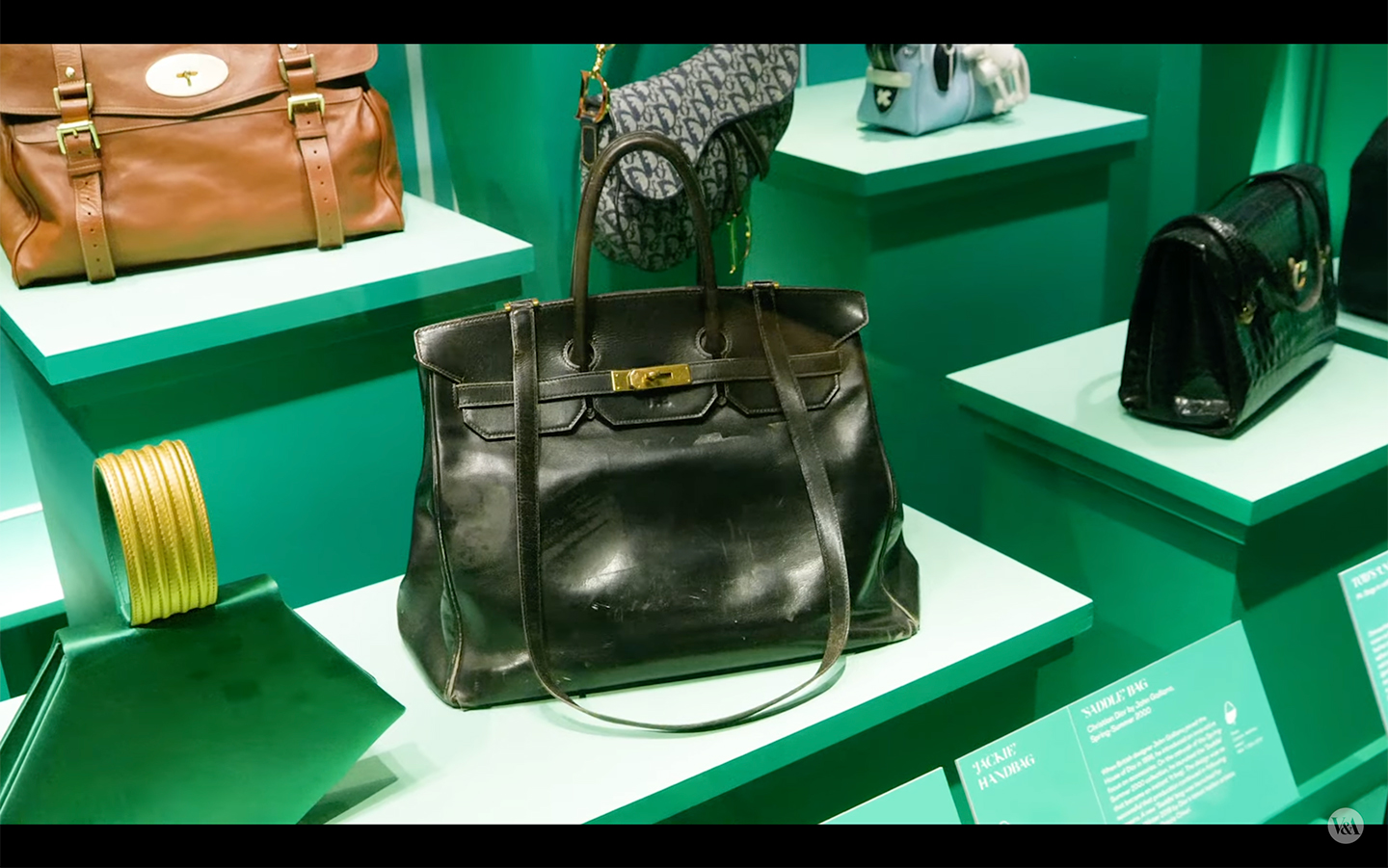 The first-ever made Hermès Birkin bag, owned by Jane Birkin, at the V&A exhibition in London - Bags: Inside Out 2021-2022, sponsored by Mulberry. Source: V&A Exhibition Video 