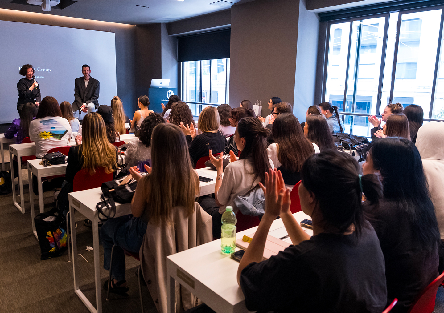 Prada's Danilo Alberti with Fashion Design Master’s students and third-year BA Fashion Design students at Istituto Marangoni in Milan