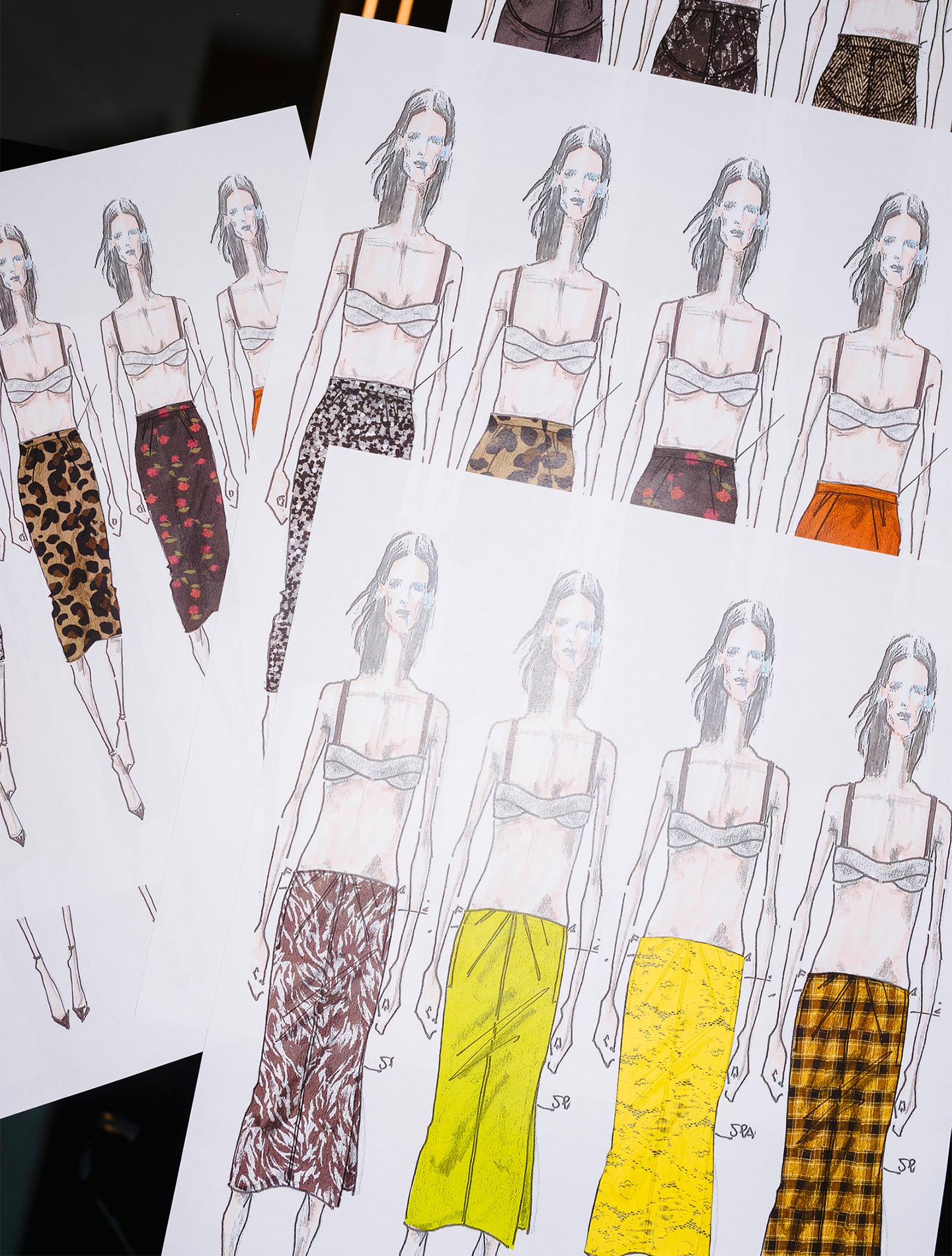 Pencil skirts sketched by Alessandro Dell'Acqua as a signature garment