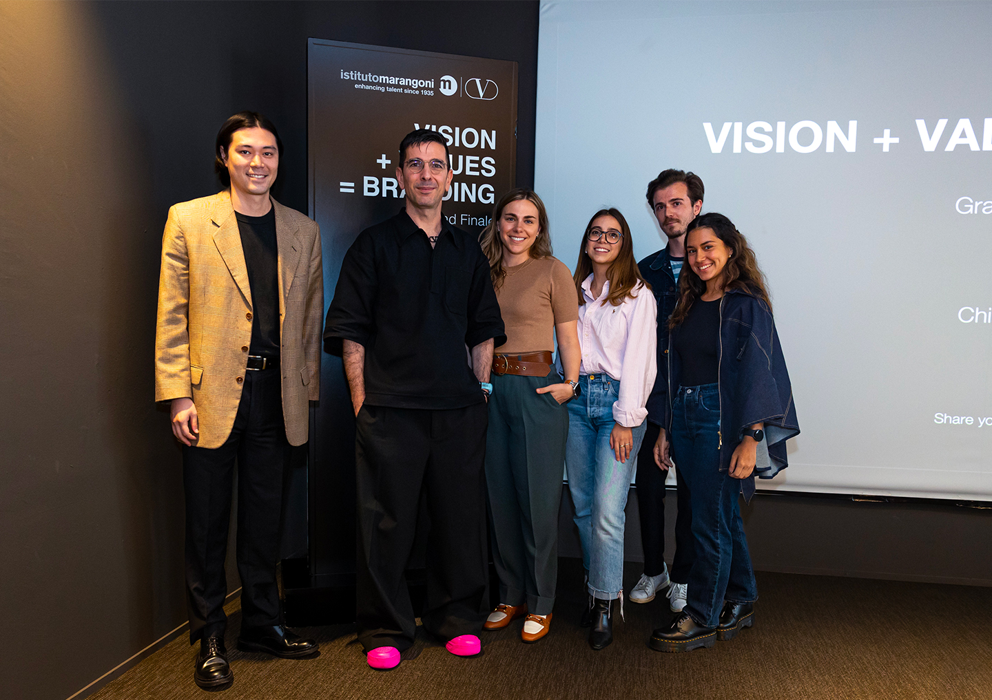 Valentino's Chief Brand Officer Alessio Vanetti with the winning group who will have a veritable Valentino experience in the upcoming months