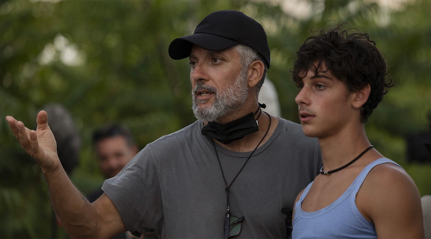 First-time filmmaker Beppe Fiorello with actor Samuele Segreto on set of Stranizza d'amuri