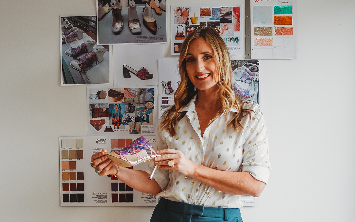 Shoe designer Laura See showing one of her best sellers in her studio 