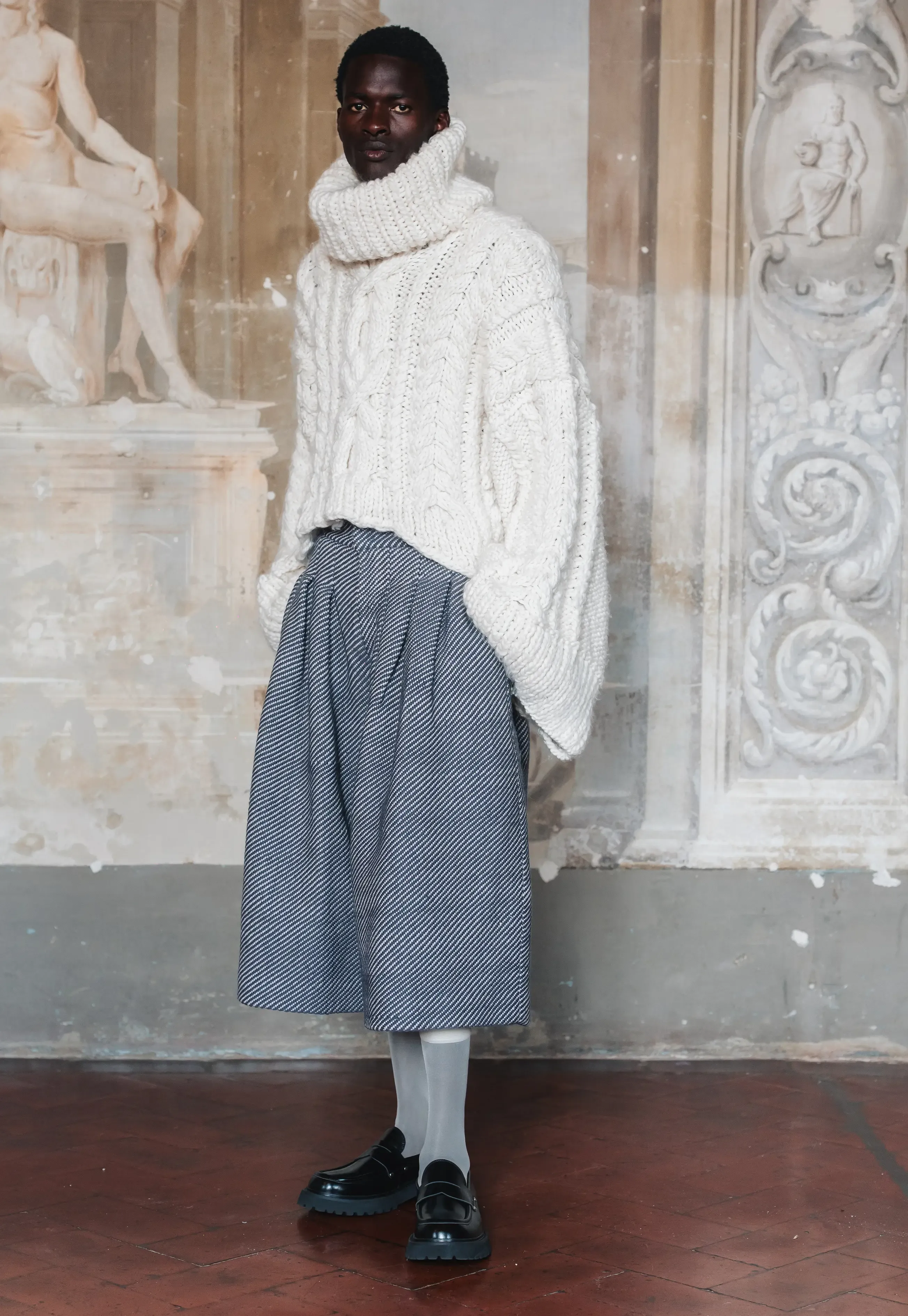image Why do men wear oversized clothes? An emerging designer on masculine vulnerability