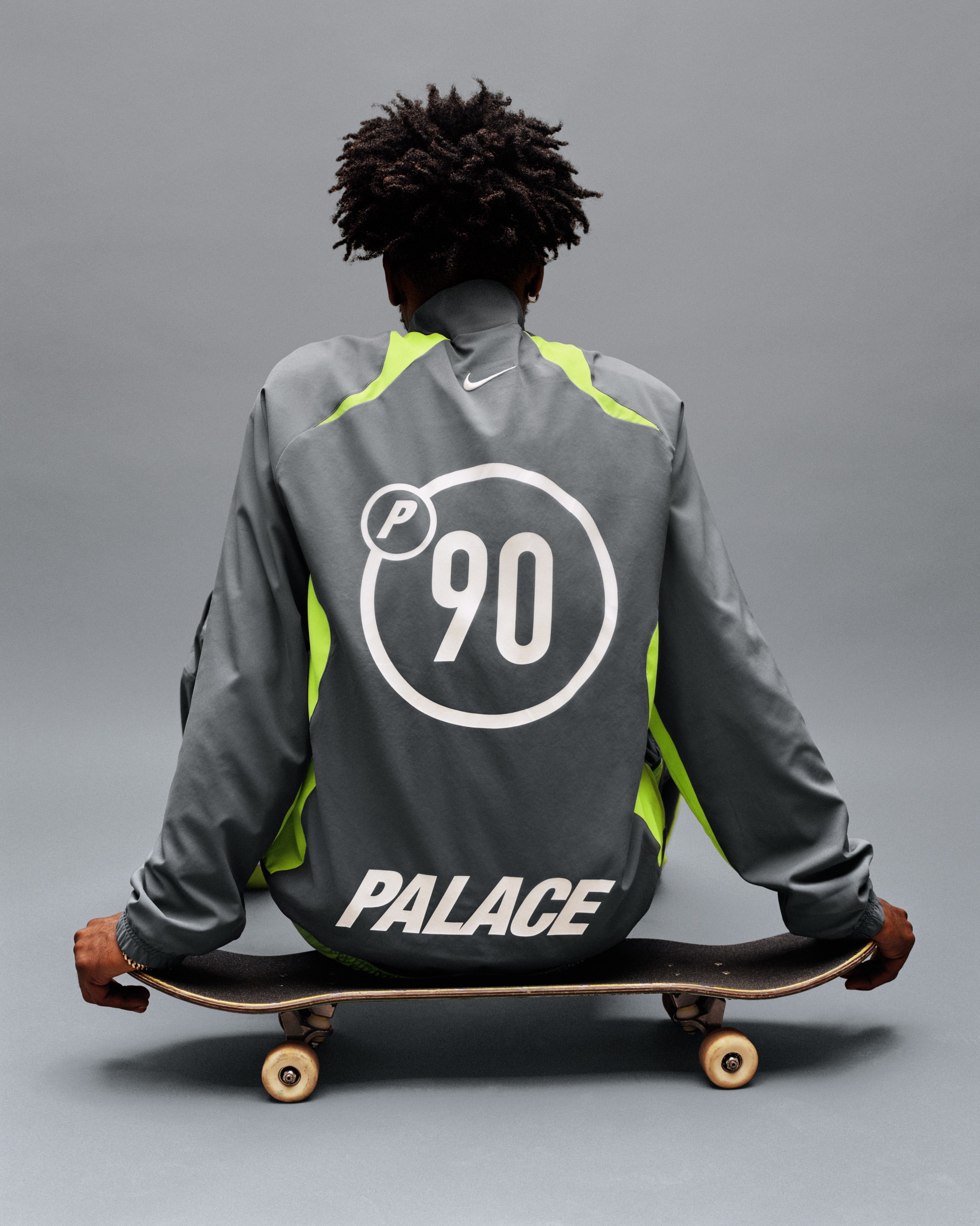The Nike x Palace P90 tracksuit merges skate culture and football heritage, reimagined with bold neon graphics and street precision